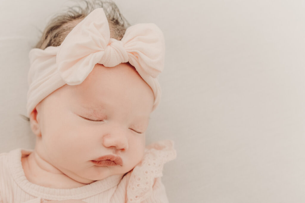 close up shot of newborn baby girl - newborn photography by Jamie Simmons